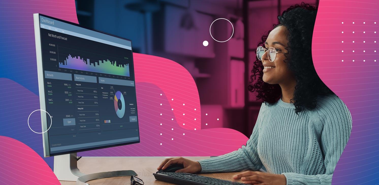 woman looking at sales dashboard on computer